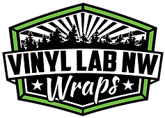“WrapJax Tacoma: A skilled technician meticulously applies a vibrant and durable wrap to a car, showcasing the high-quality car wrapping services available in Tacoma.”